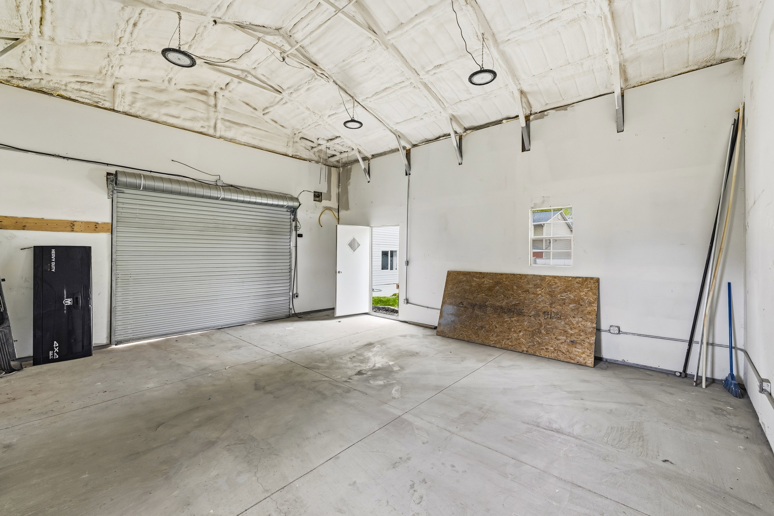 View of 20x24 shop with a 15 ft ceiling structure