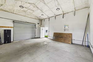 View of heated 20x24 shop with a 15 ft ceiling structure