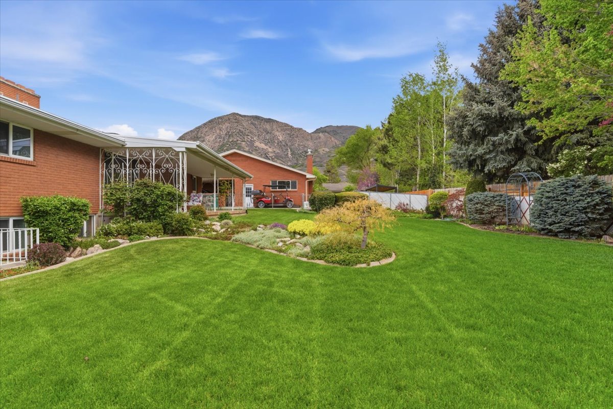 View of yard with a mountain view