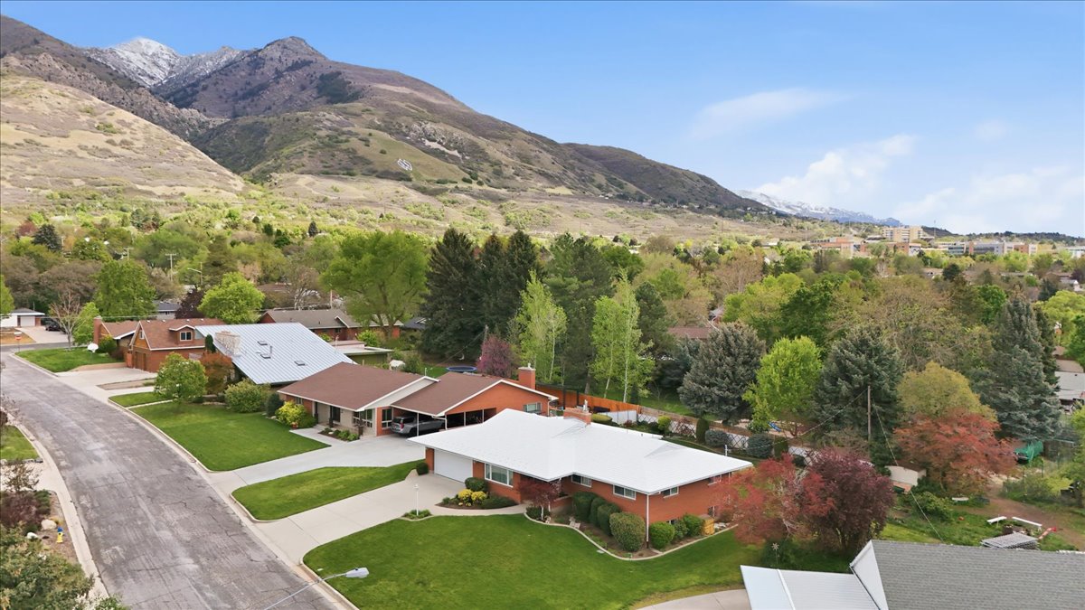 Aerial perspective of suburban area with mountains