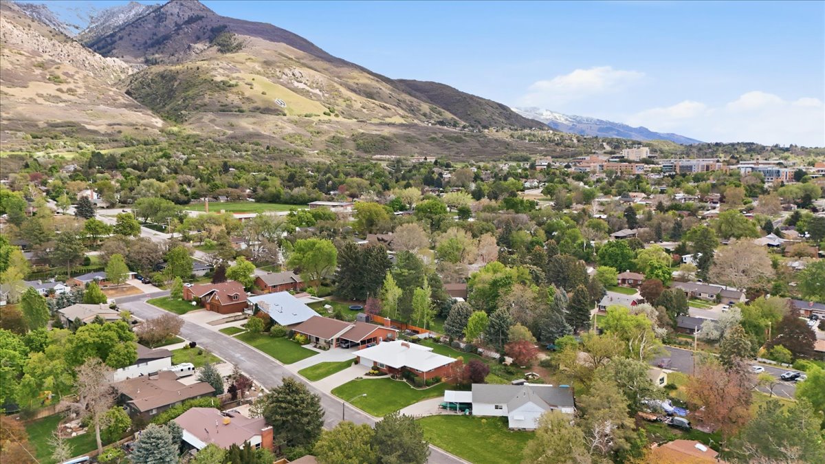 Aerial view of residential area with mountains