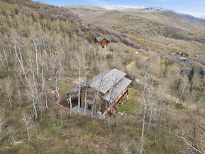 View from above of property featuring a mountainous background