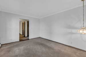 Spare room with crown molding