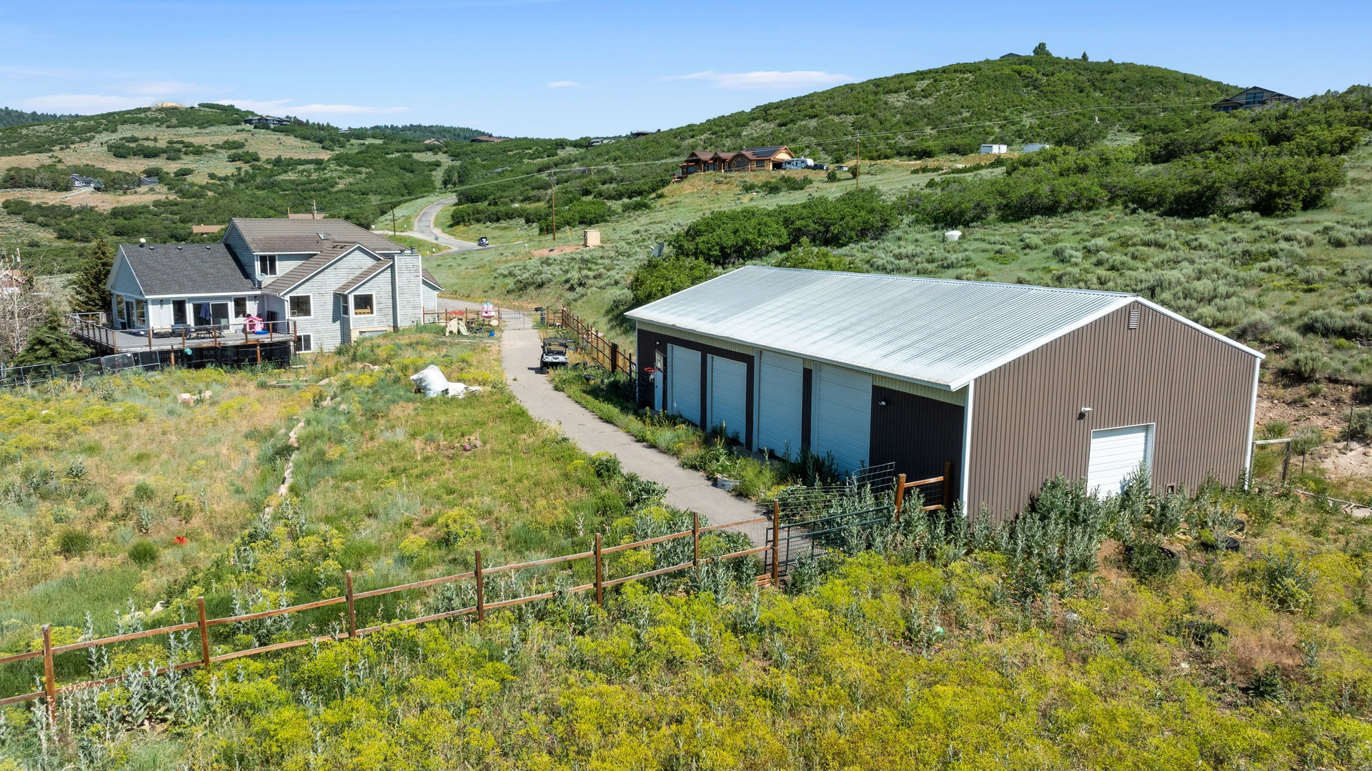 Aerial view of sparsely populated area featuring a mountain backdrop