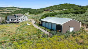 Aerial view of sparsely populated area featuring a mountain backdrop