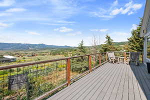 Deck featuring a mountain view