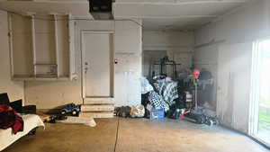 Garage featuring a garage door opener