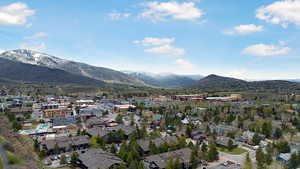 Aerial perspective of suburban area with mountains