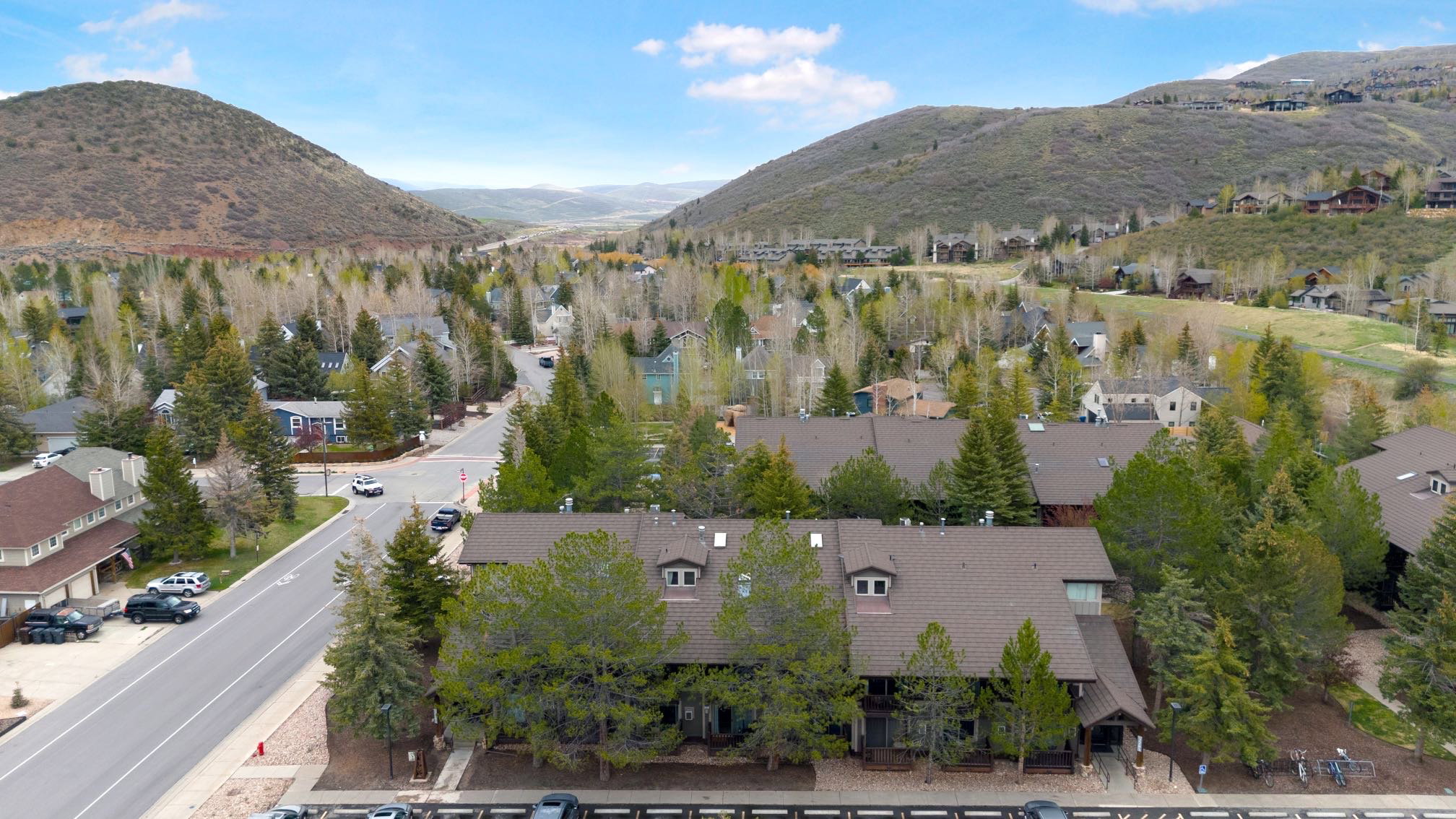 Aerial perspective of suburban area featuring mountains