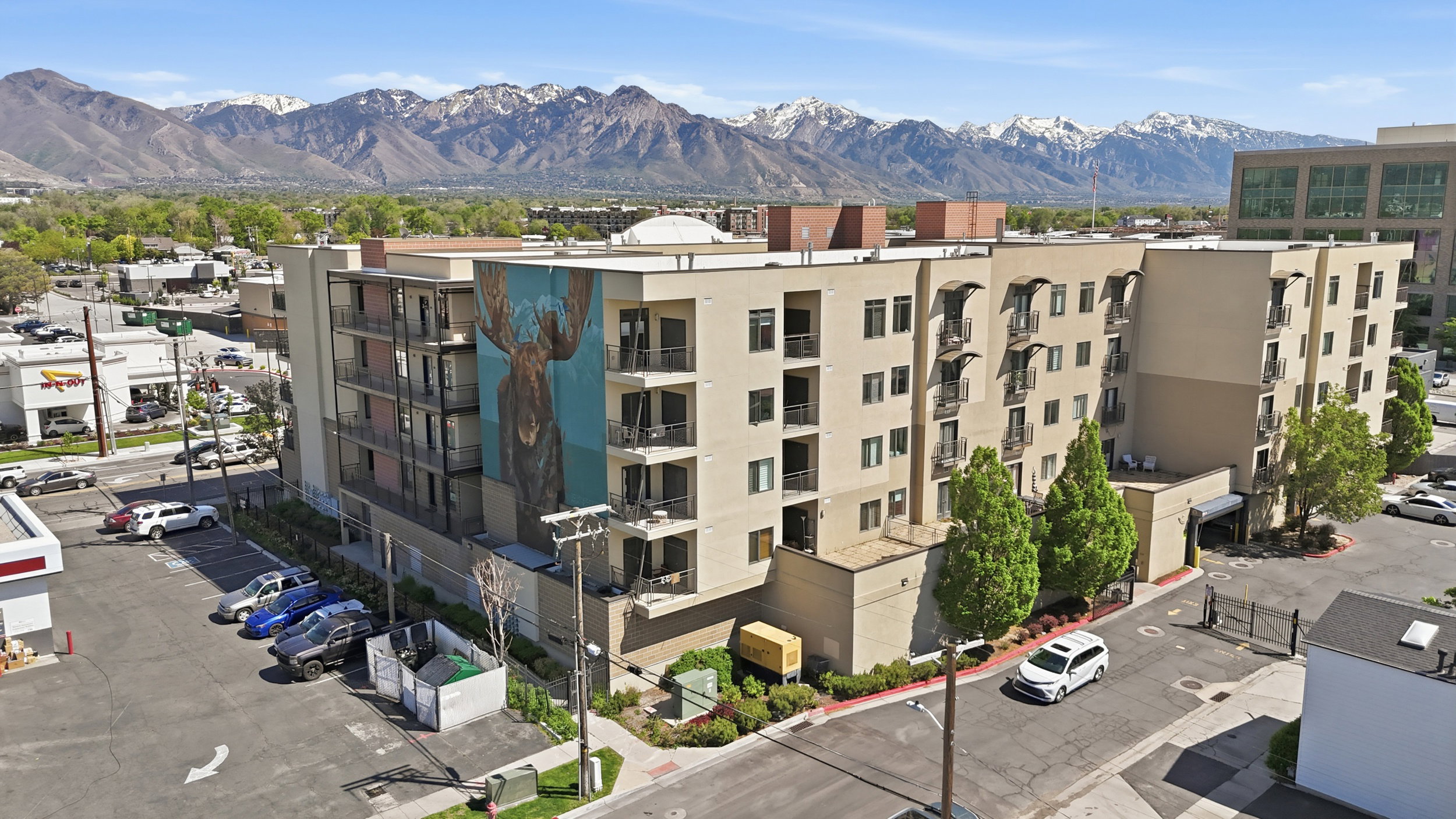 View of apartment building / complex featuring a mountain view