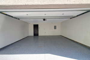 Finished with EV Charging, Epoxy Floor, Insulated Garage Door, Hose Bib