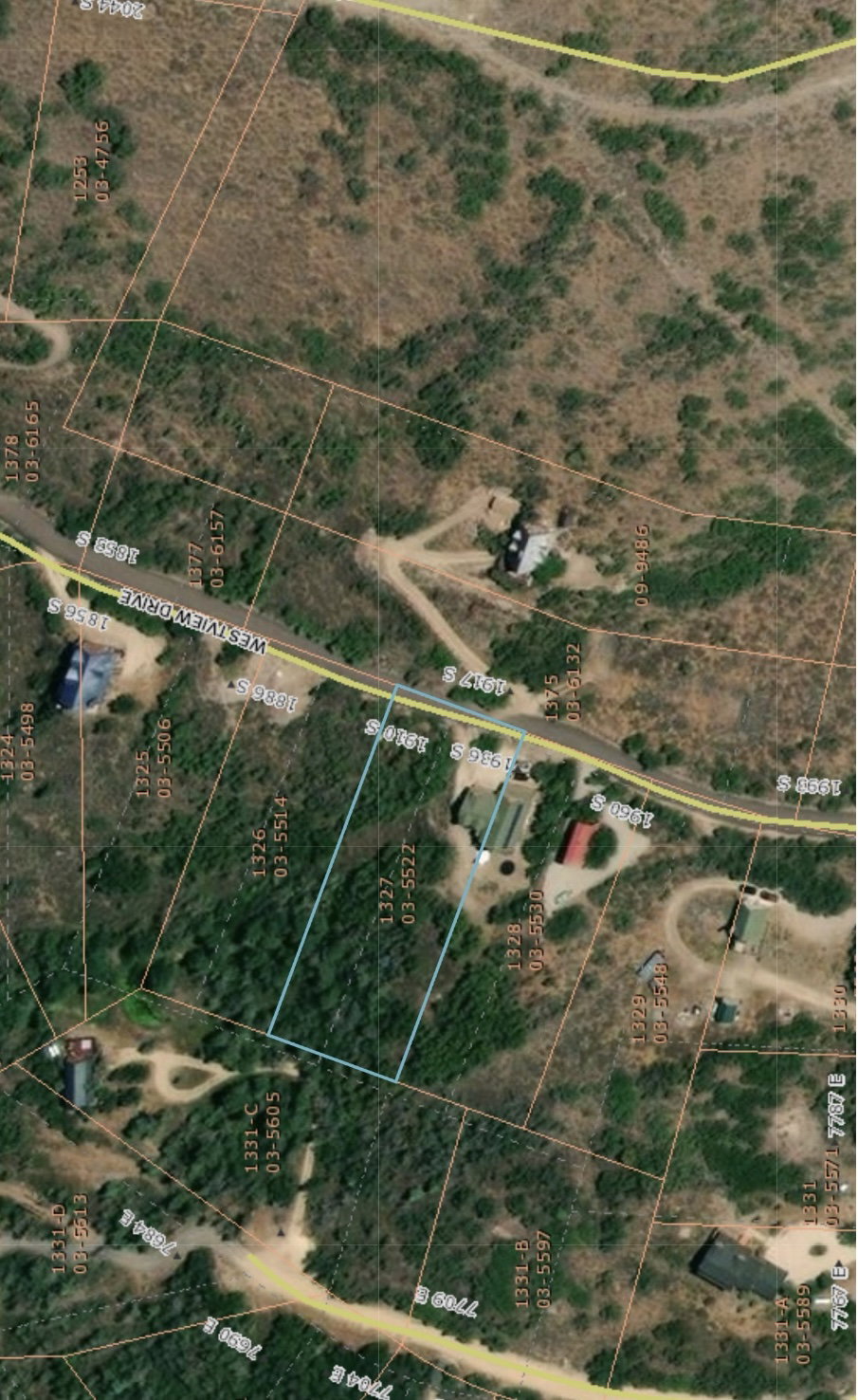 Aerial map of property and surrounding area featuring property boundaries highlighted