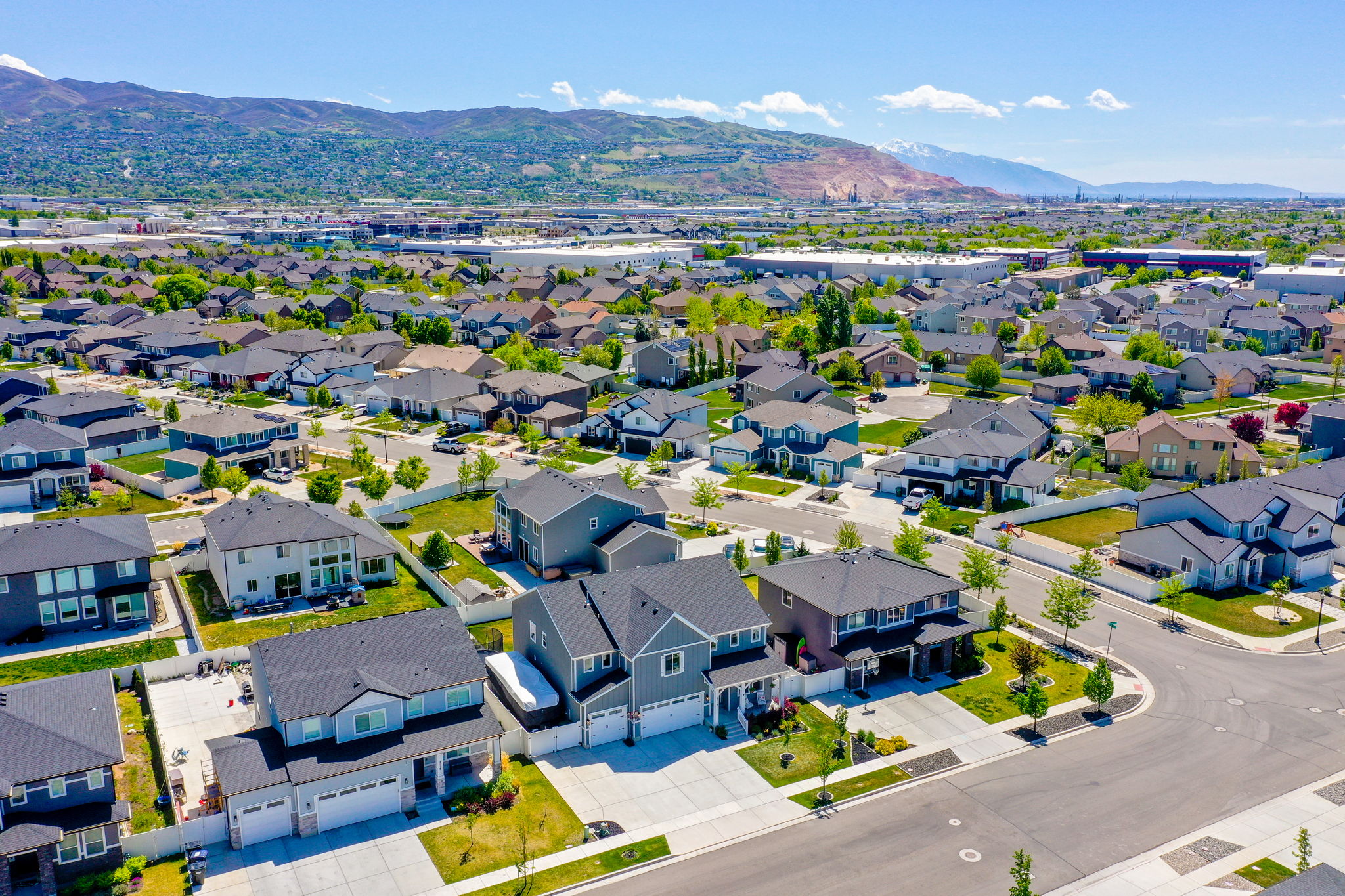 Aerial view of residential area with a mountain backdrop