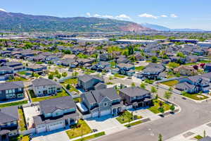 Aerial view of residential area with a mountain backdrop
