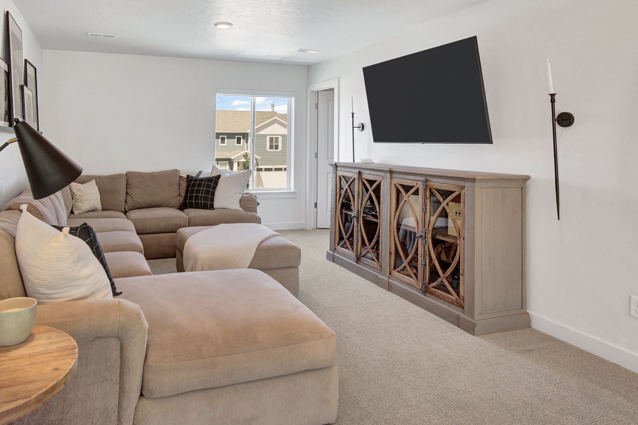 Living room featuring light colored carpet