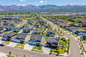 Aerial view of residential area with a mountainous background