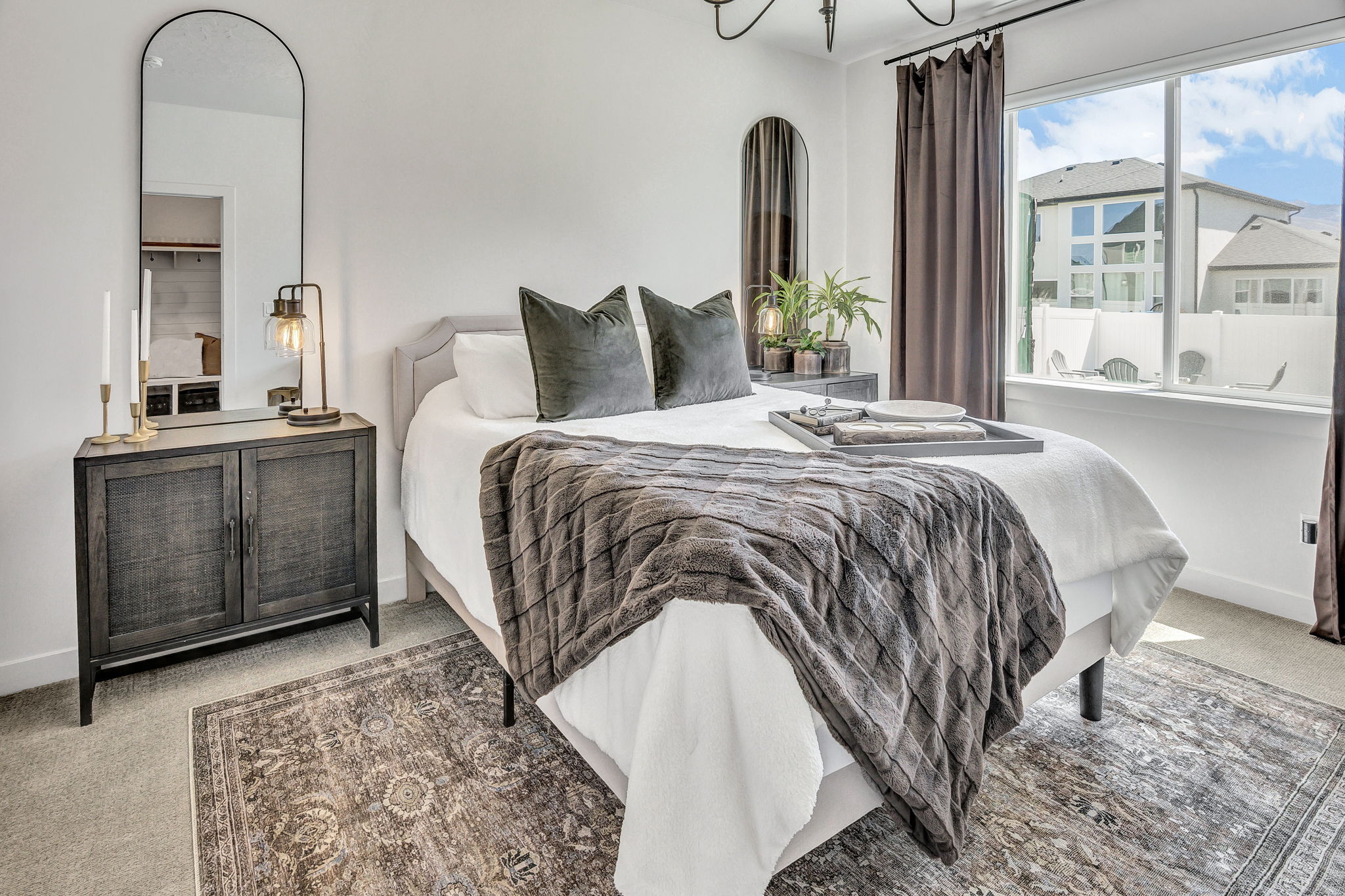 Bedroom with carpet and baseboards