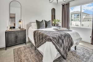 Bedroom with carpet and baseboards