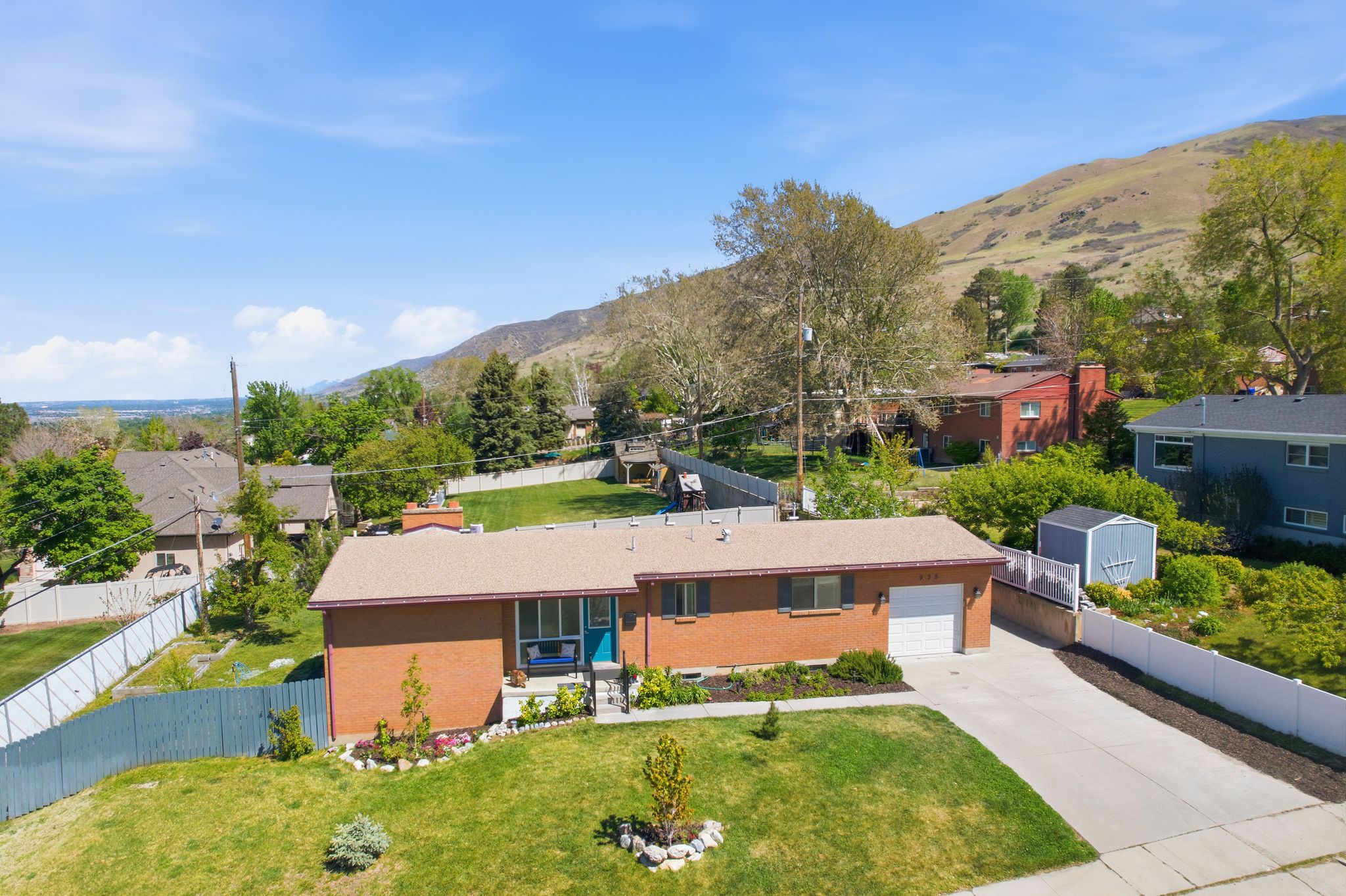 Aerial view of residential area with mountains