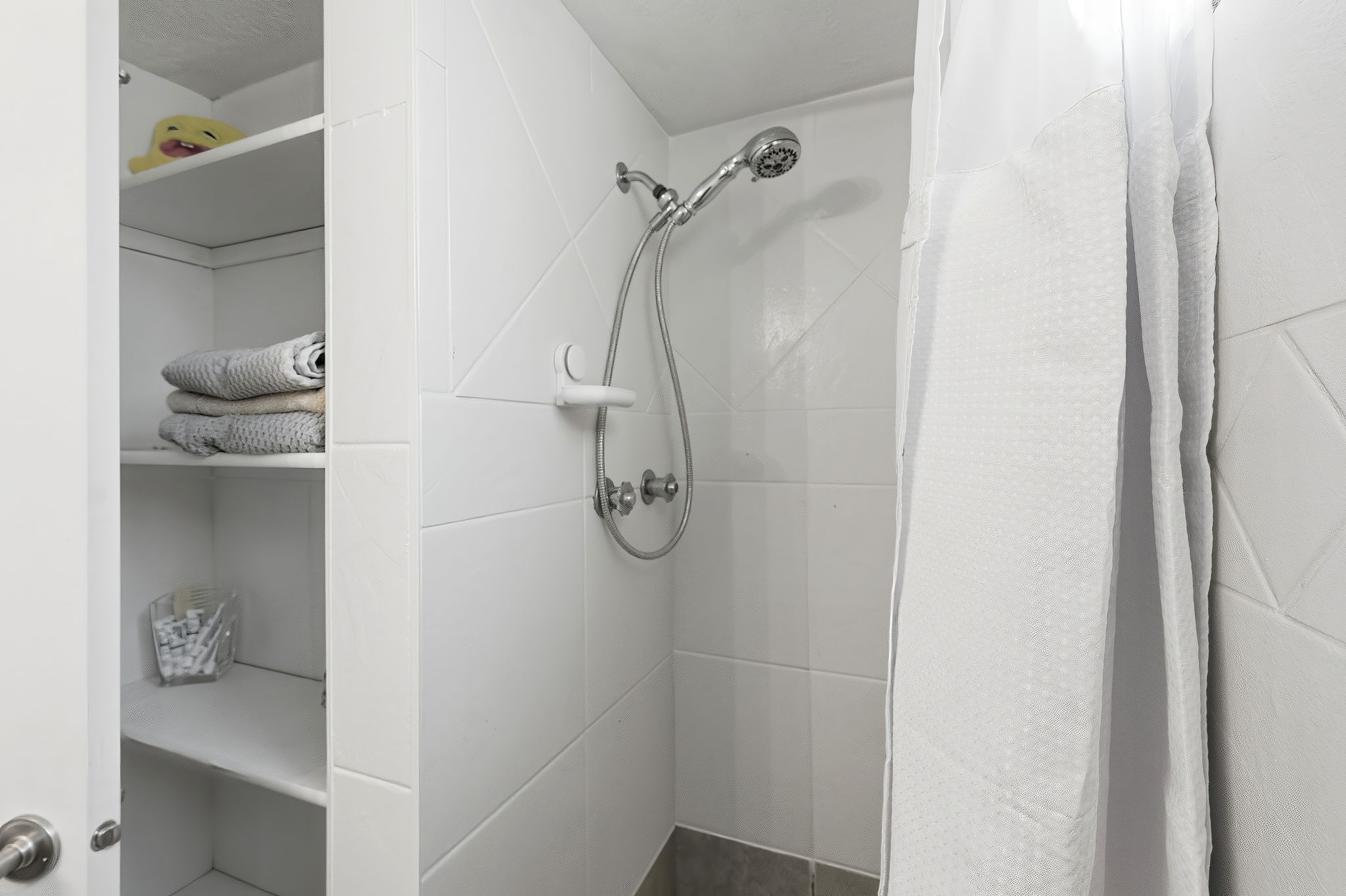 Full bathroom with a stall shower