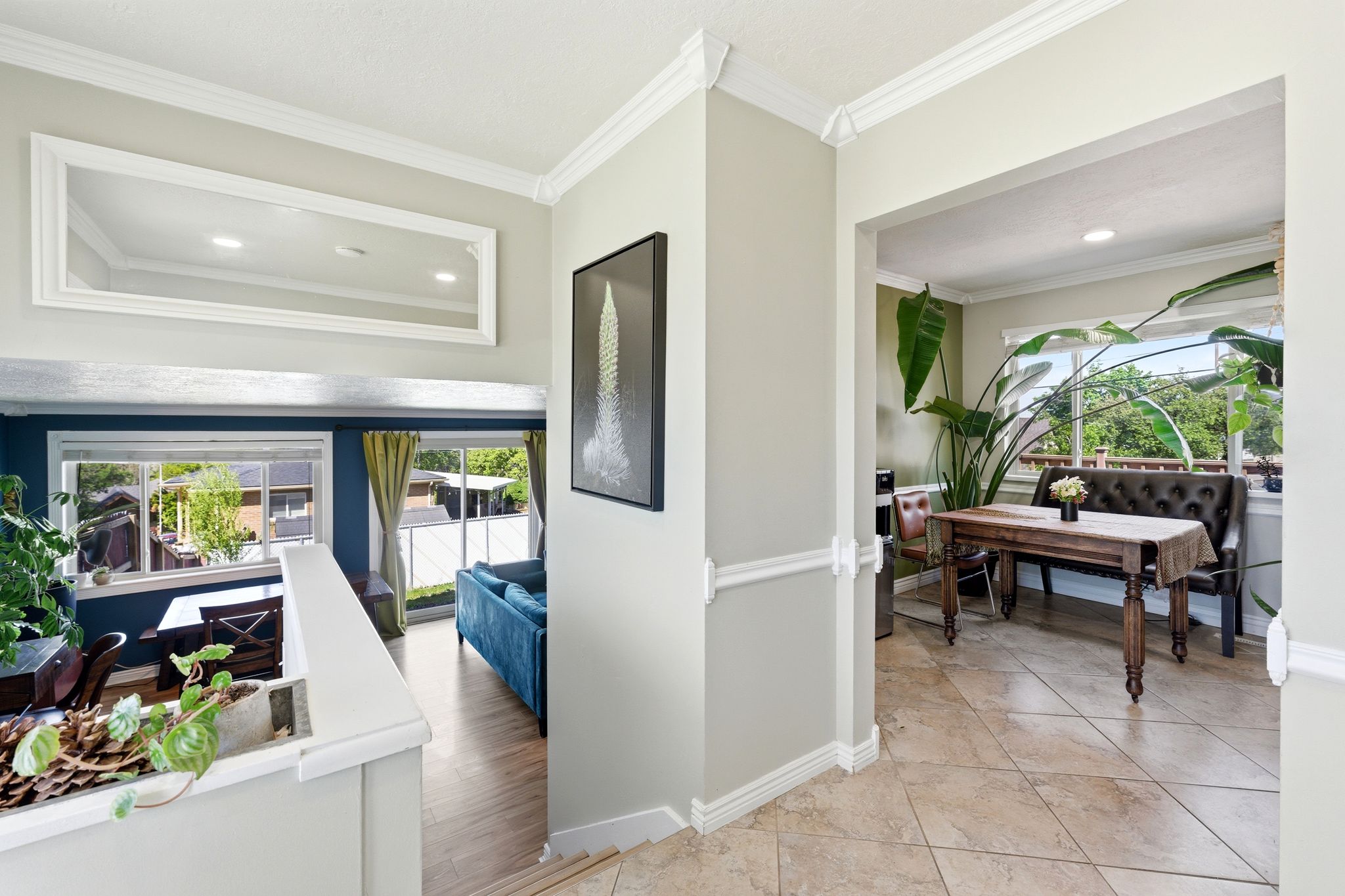 Hallway featuring ornamental molding and recessed lighting