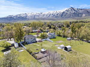 Aerial perspective of suburban area with a mountain backdrop