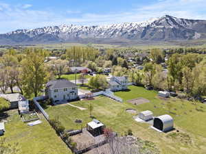 Aerial view of residential area featuring a mountainous background