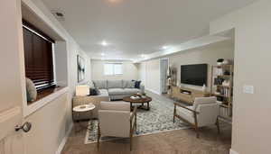 AI-generated staging - Back of great room  - Carpeted living area featuring baseboards and recessed lighting