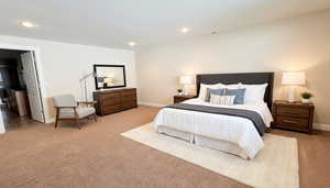 AI Generated Staging -Bedroom featuring light carpet and recessed lighting