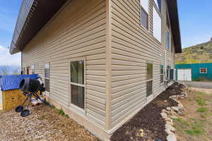 View of home's exterior with a mountain view