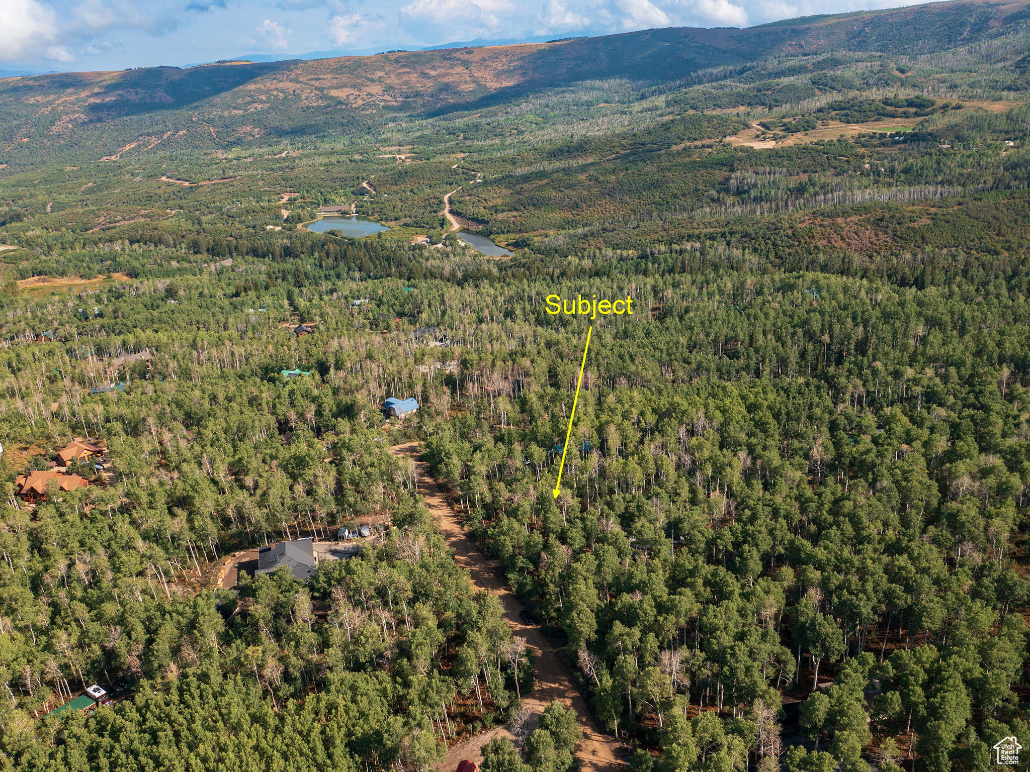 Drone / aerial view of a mountain backdrop
