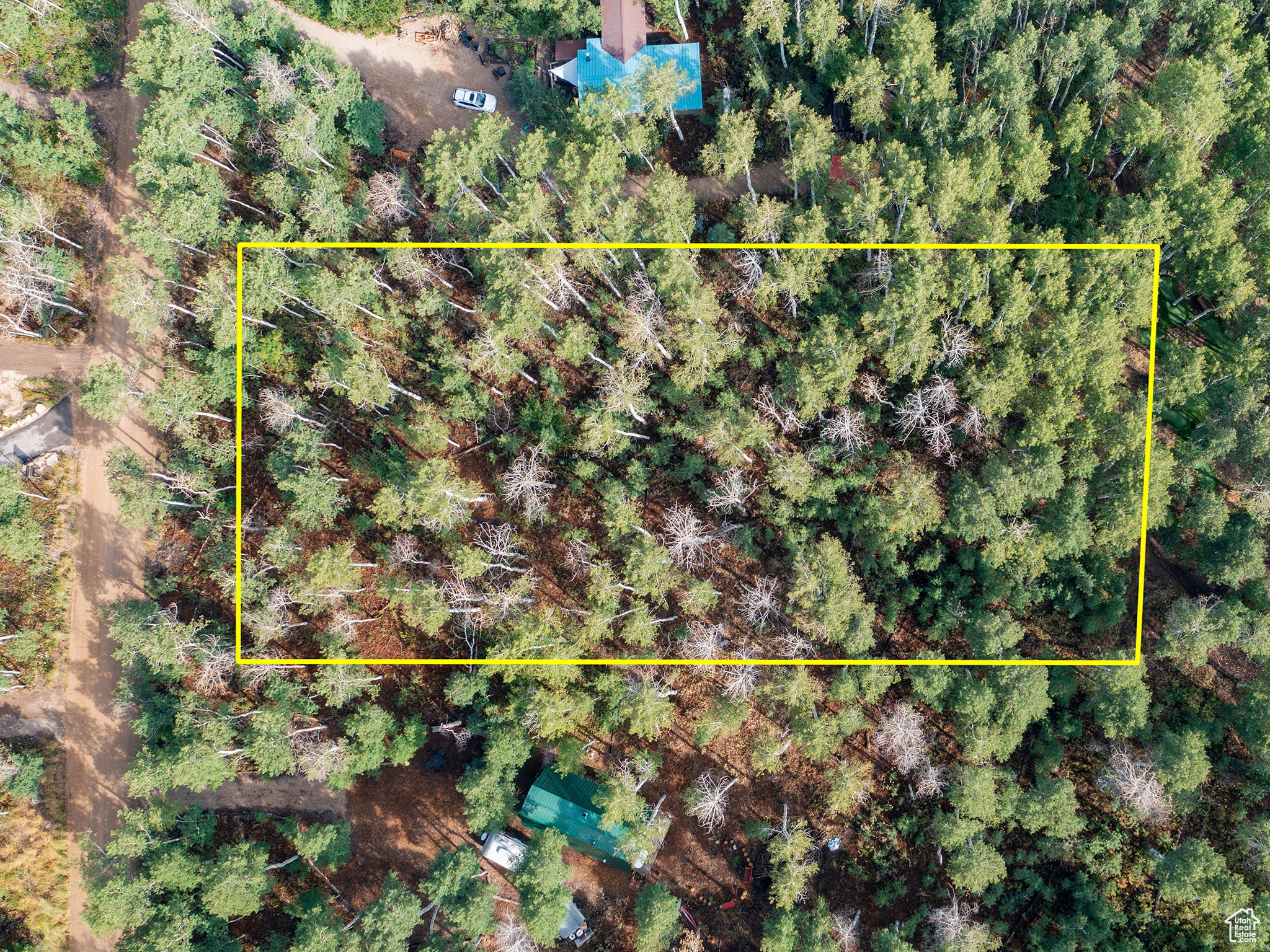 Aerial overview of property's location with property parcel outlined
