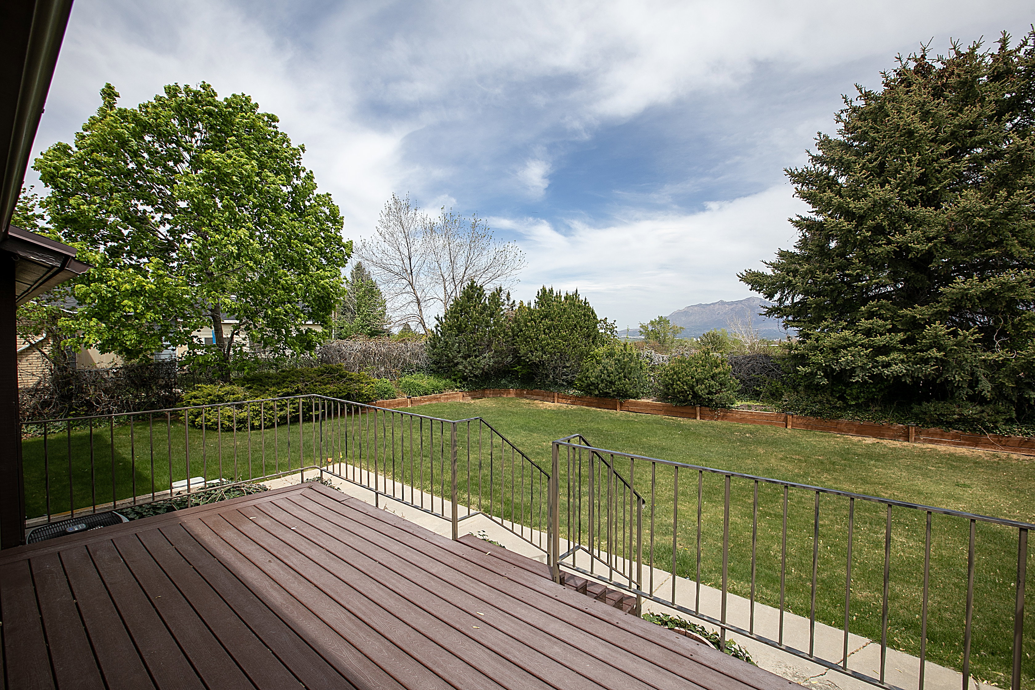 Deck featuring a fenced backyard