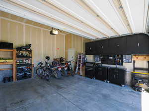 Garage featuring a garage door opener