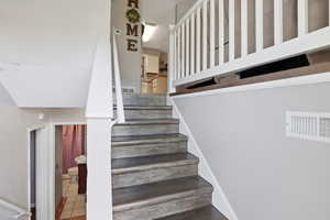 Stairway with tile patterned floors