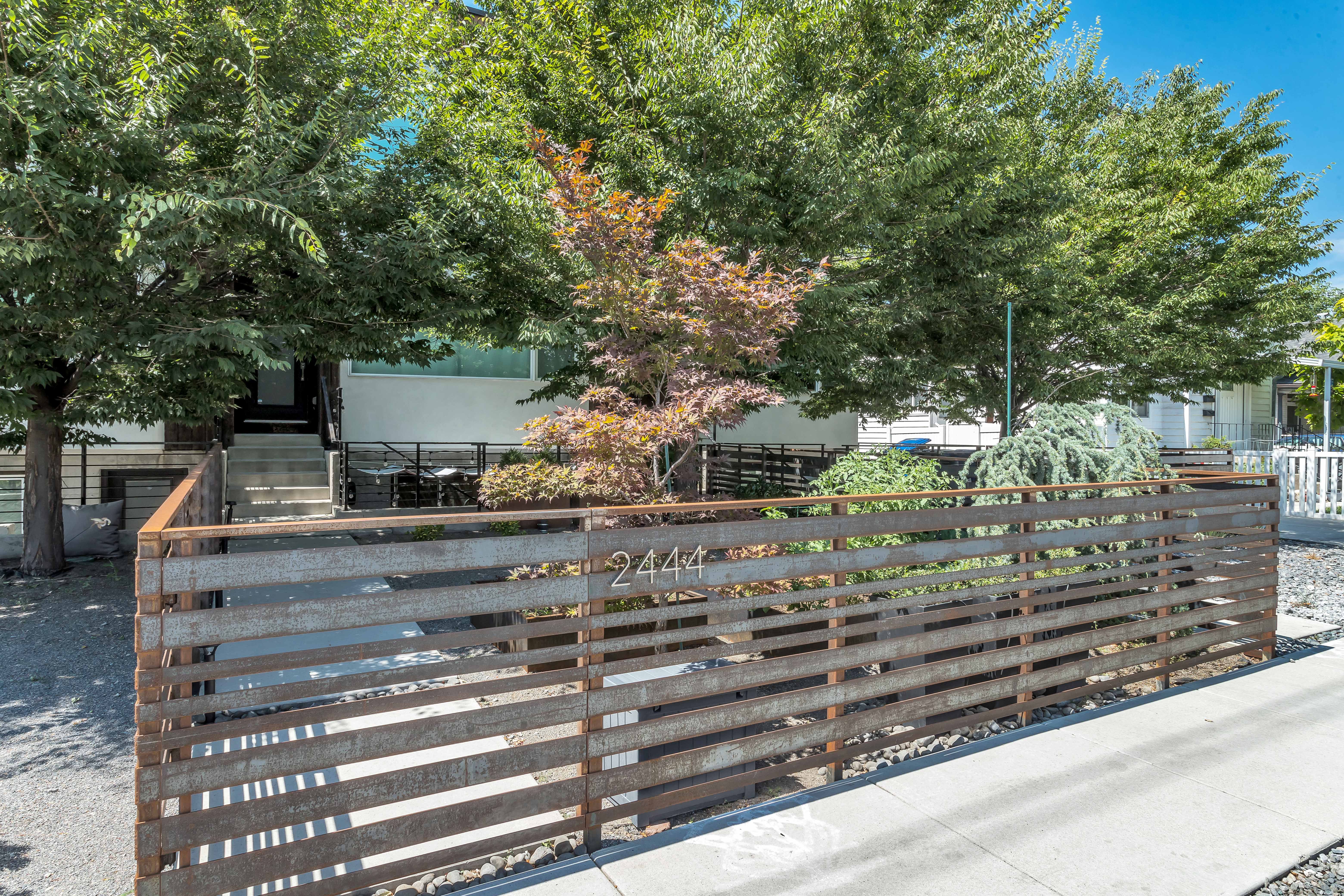 View of front of house featuring a fenced front yard