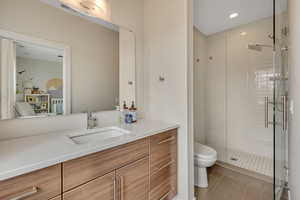 Full bath with a stall shower, vanity, and recessed lighting located off the 2nd bedroom making 2 on suite bedrooms upstairs