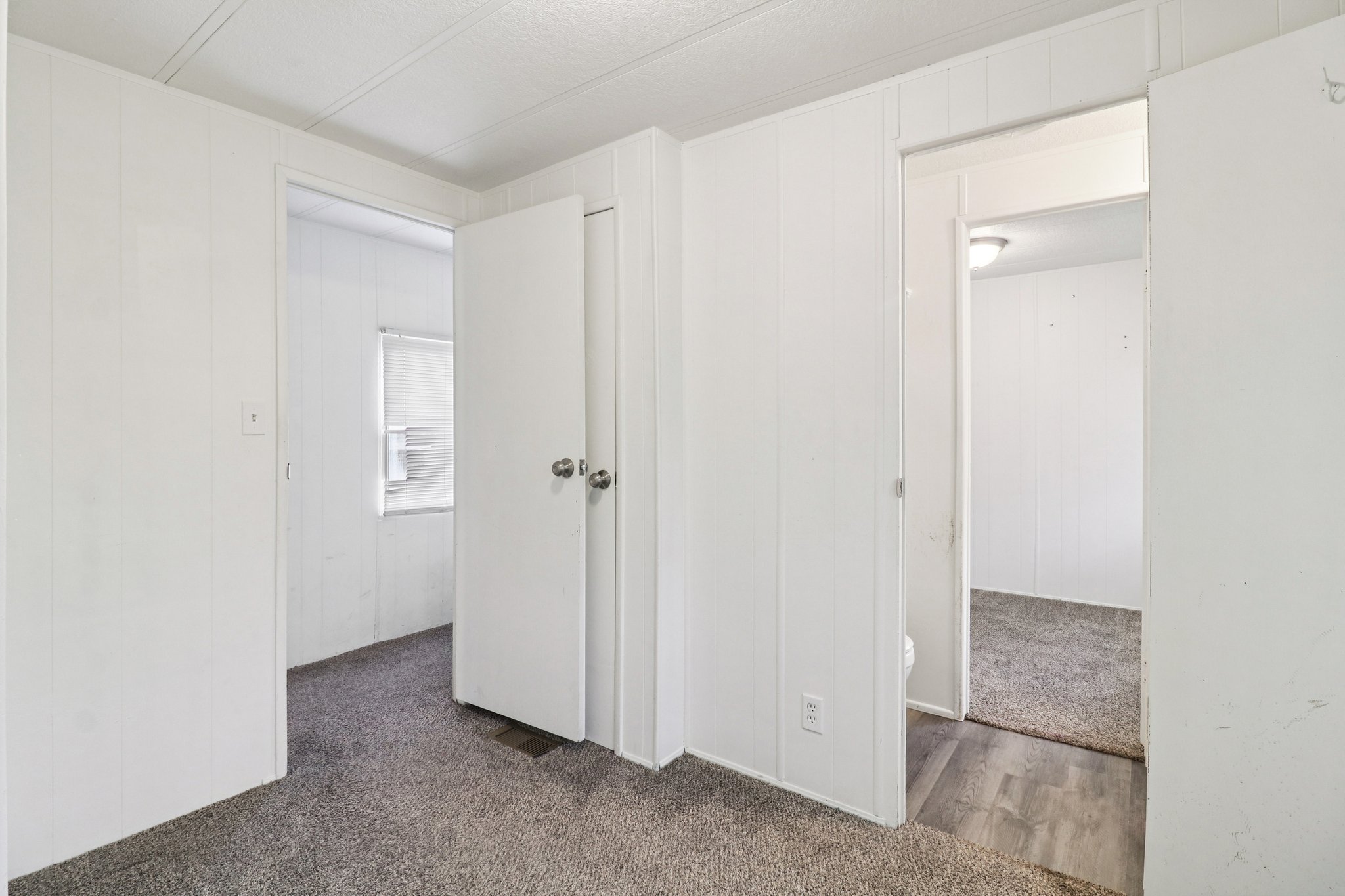 Unfurnished bedroom featuring carpet