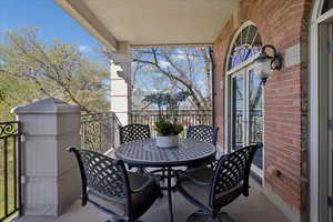 Balcony featuring outdoor dining area