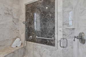 Full bathroom featuring a tile shower