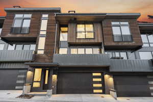 Contemporary home with a garage and driveway