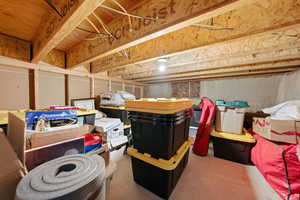 Storage under floor of primary bedroom