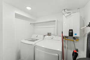 ADU laundry room with tankless water heater
