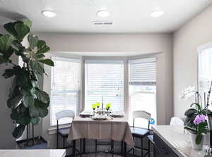 Optional dining seating in bay window.