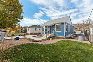 Bungalow with fully fenced, landscaped yard and raised garden boxes