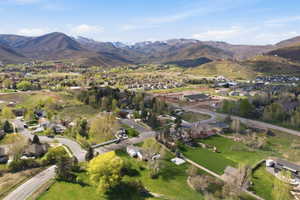 Aerial view of residential area featuring mountains