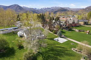 Aerial view of residential area with a mountainous background
