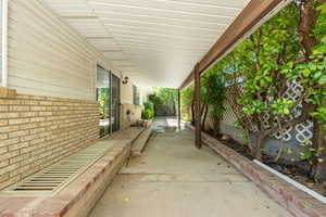 Fenced backyard featuring a patio