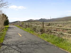 View of asphalt road featuring a mountain view