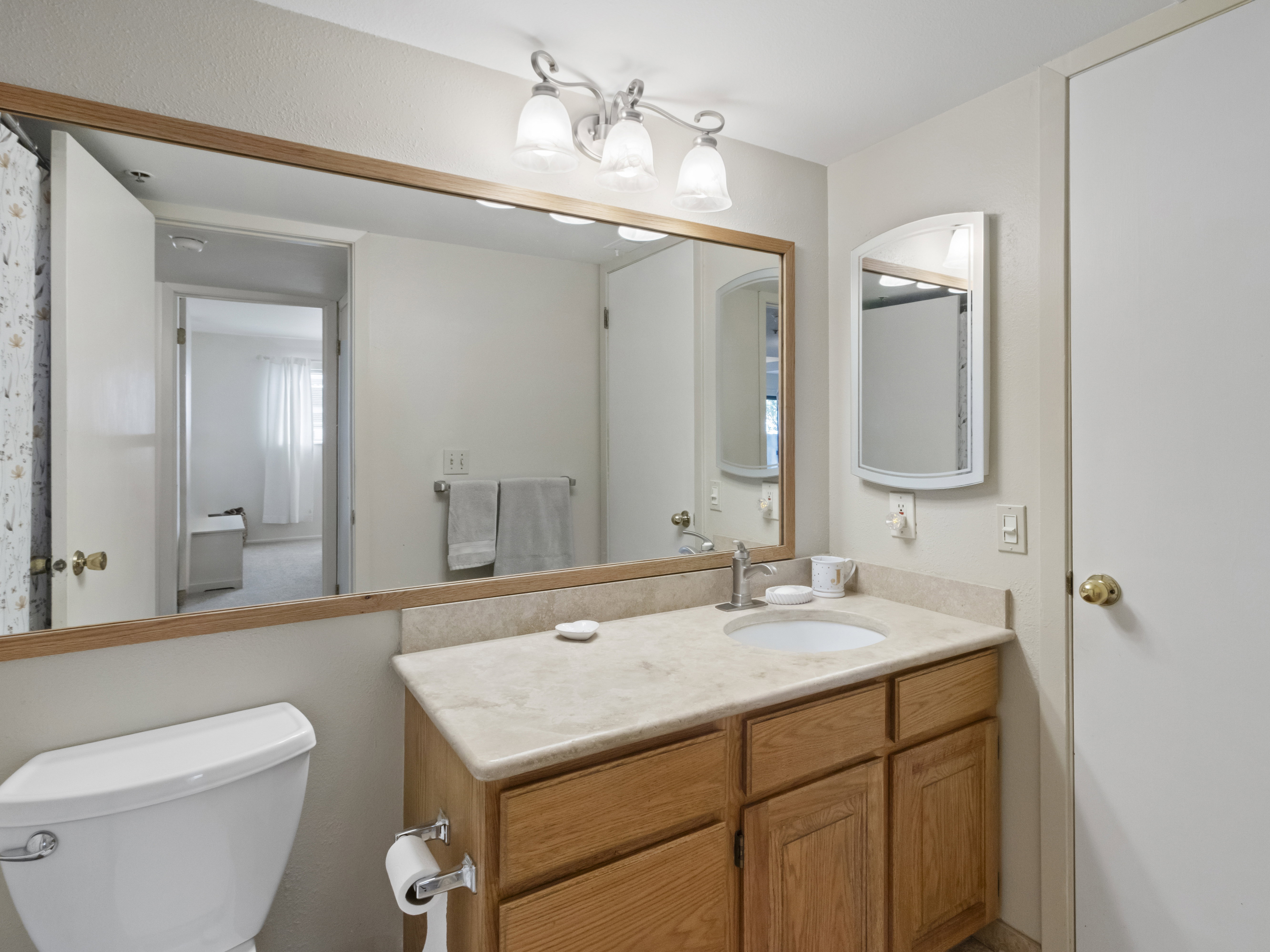 Bathroom featuring toilet and vanity